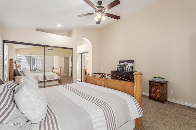 carpeted bedroom with visible vents, baseboards, vaulted ceiling, recessed lighting, and arched walkways