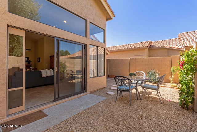 view of patio / terrace with fence