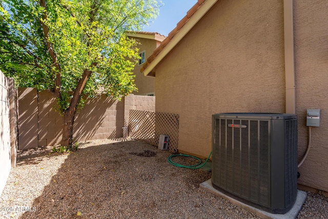 view of yard featuring cooling unit and a fenced backyard