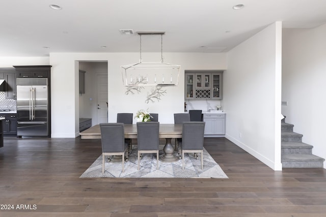 dining room featuring dark hardwood / wood-style floors