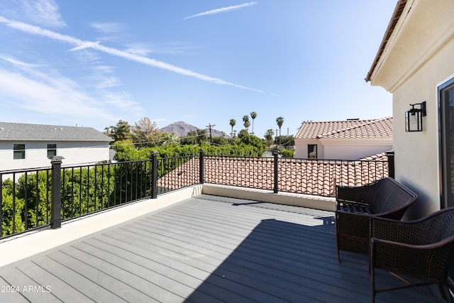 wooden terrace with a mountain view