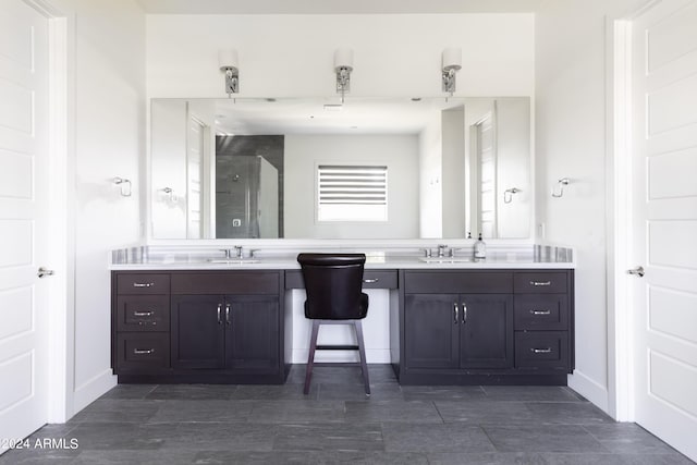 bathroom with vanity and walk in shower