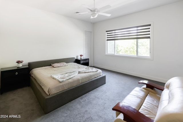 carpeted bedroom featuring ceiling fan