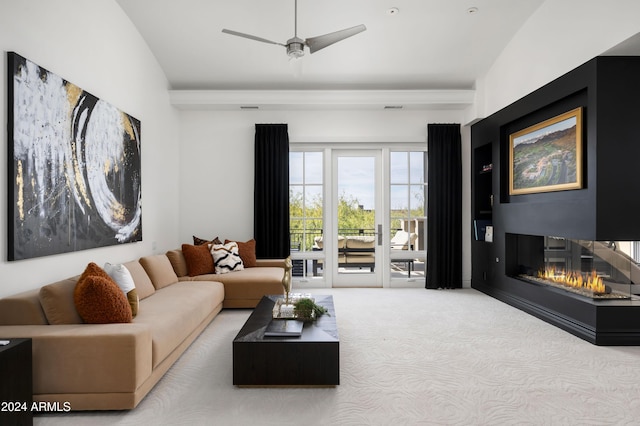 living room with ceiling fan and light colored carpet