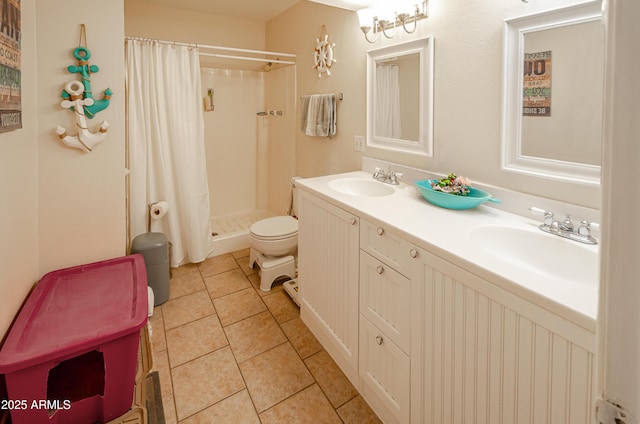 bathroom featuring curtained shower, toilet, tile patterned flooring, and vanity