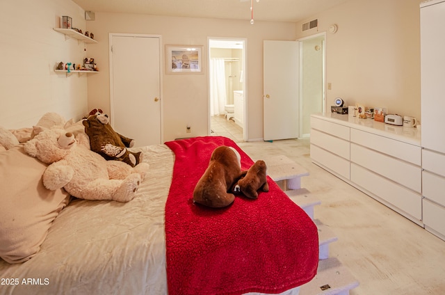 bedroom with connected bathroom