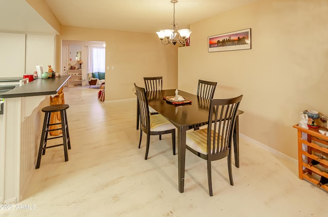 dining area with a chandelier