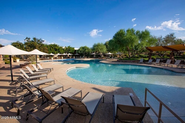 3935 E Rough Rider Rd Unit 1066, Phoenix, AZ 85050 - community pool featuring a patio area