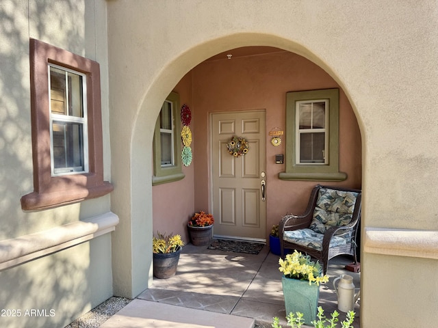 3935 E Rough Rider Rd Unit 1066, Phoenix, AZ 85050 - view of exterior entry with stucco siding