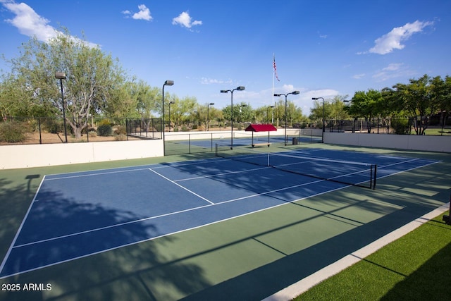 3935 E Rough Rider Rd Unit 1066, Phoenix, AZ 85050 - view of tennis court with community basketball court