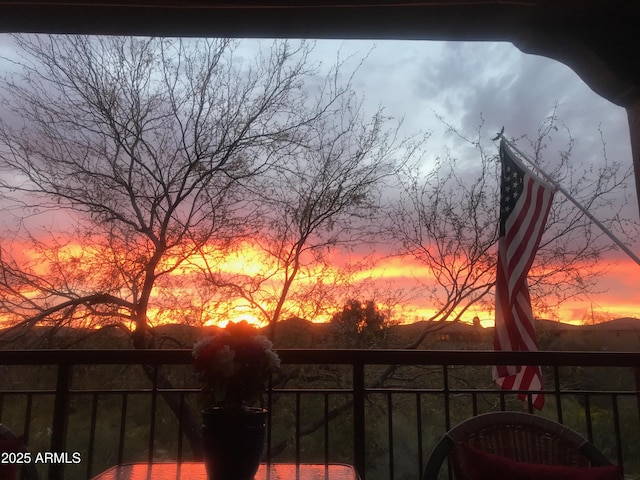 3935 E Rough Rider Rd Unit 1066, Phoenix, AZ 85050 - view of balcony at dusk