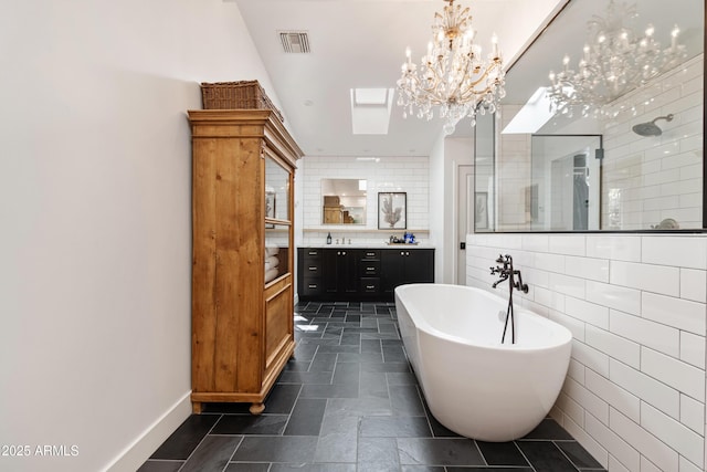 bathroom featuring vanity, shower with separate bathtub, and tile walls