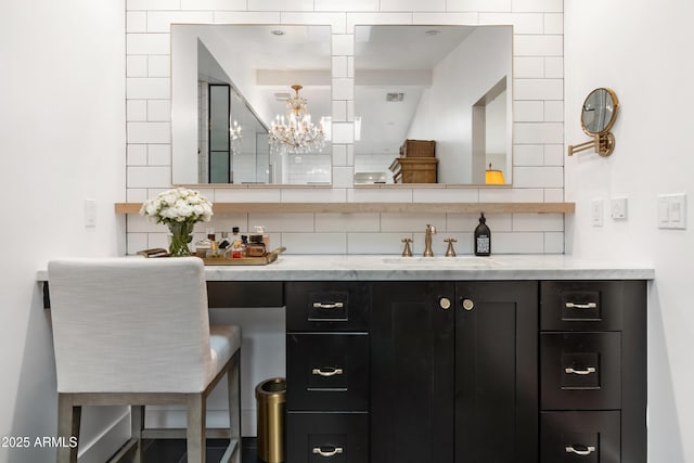 bar featuring sink and backsplash