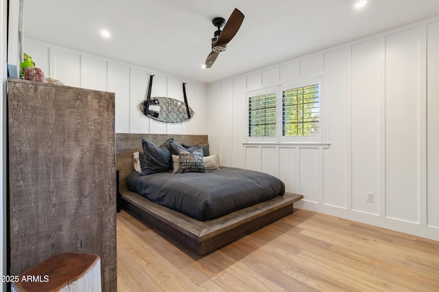 bedroom featuring ceiling fan and light wood-type flooring