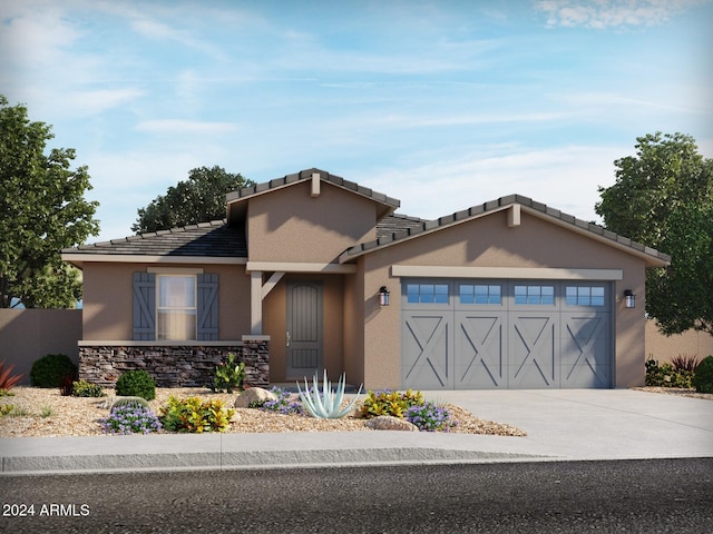 view of front of property featuring a garage