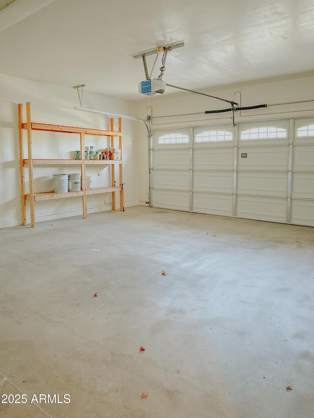 garage featuring a garage door opener