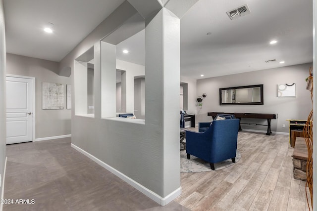 hall with baseboards, recessed lighting, and wood finished floors