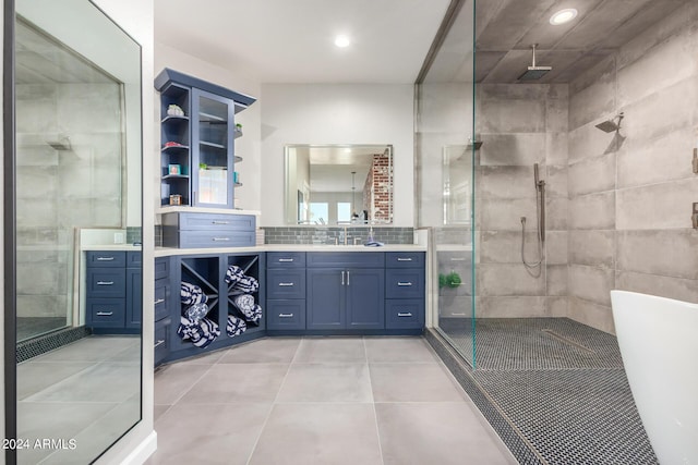 full bathroom with a shower stall, vanity, tile patterned floors, and recessed lighting