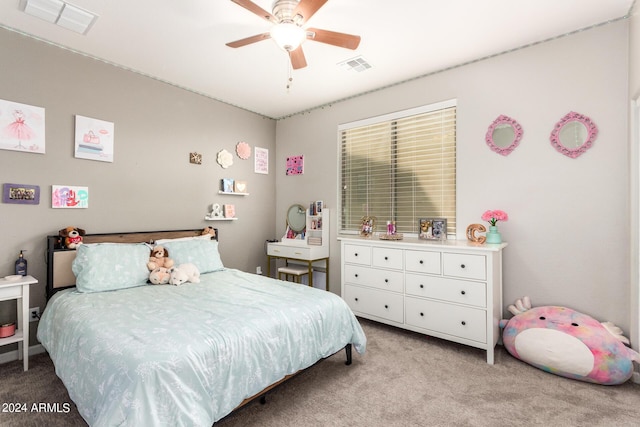 bedroom with light carpet and ceiling fan