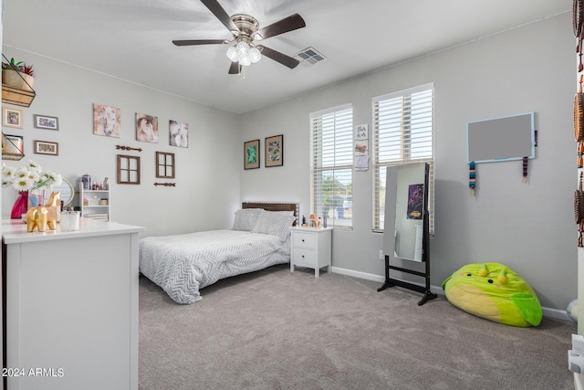 bedroom featuring carpet floors, baseboards, and a ceiling fan