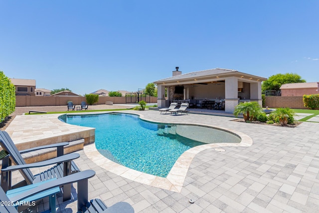 view of pool featuring a patio area and a fenced backyard