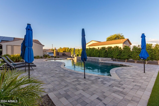swimming pool featuring a patio