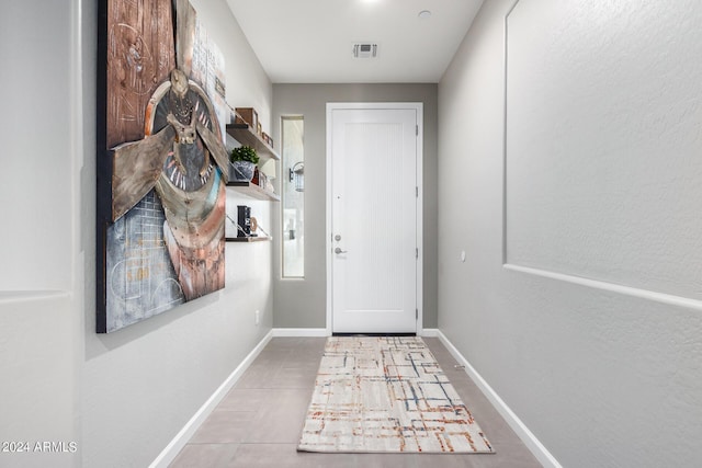 doorway with baseboards