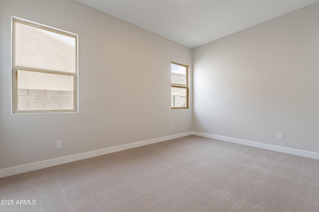 empty room featuring carpet floors