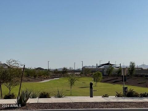 25461 W Graham Trl, Buckeye, AZ 85326 - view of home's community featuring a lawn