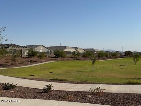 25461 W Graham Trl, Buckeye, AZ 85326 - view of home's community featuring a lawn