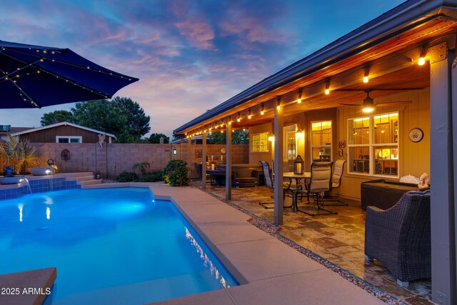 view of pool with a fenced in pool, a patio, and a fenced backyard