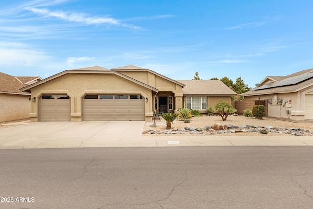 single story home with concrete driveway, roof with shingles, stucco siding, and a garage