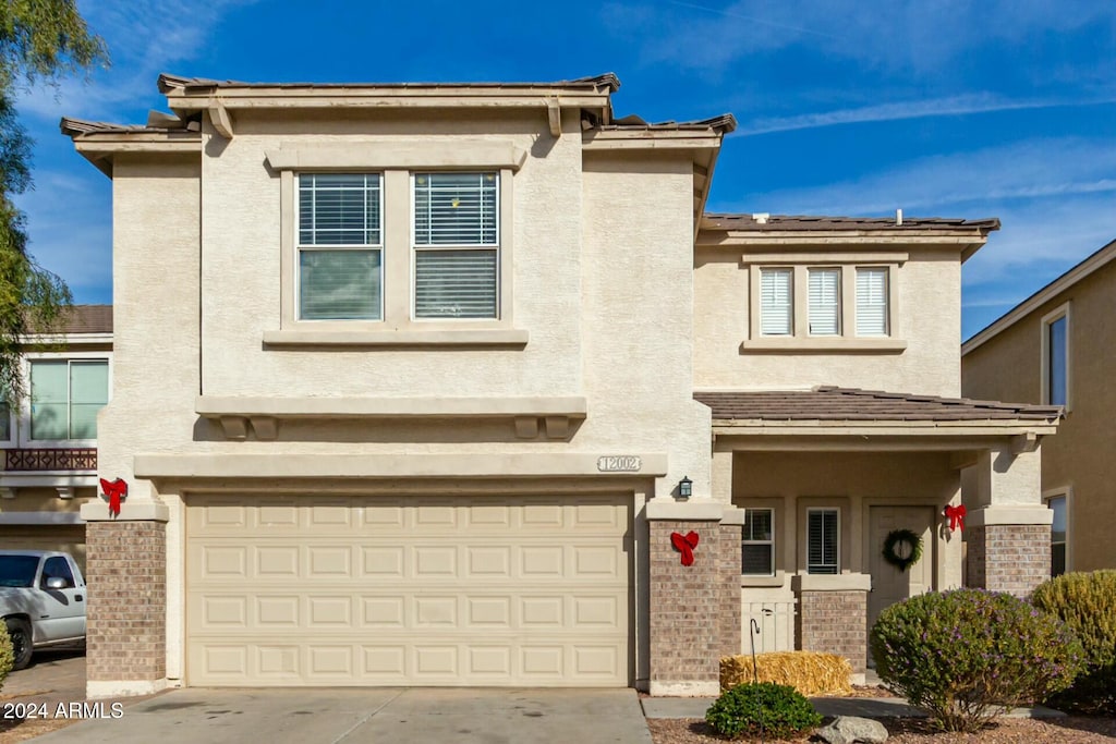 view of front of home featuring a garage