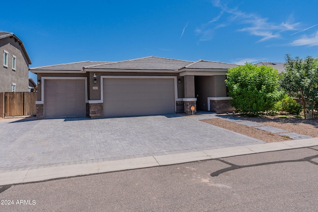 prairie-style home with a garage