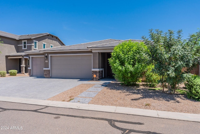 view of front of property featuring a garage