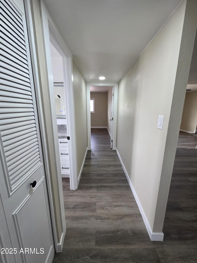 3849 W Mauna Loa Ln, Phoenix, AZ 85053 - hall with dark wood finished floors and baseboards