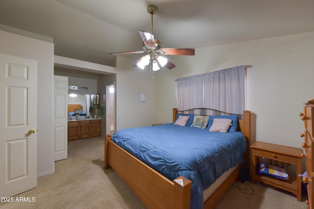 1219 E Avenida Isabela, Casa Grande, AZ 85122 - bedroom with light colored carpet, ensuite bath, and a ceiling fan