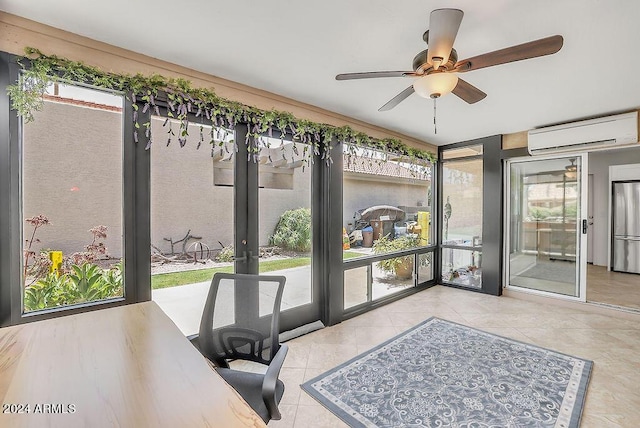 sunroom featuring ceiling fan and a wall mounted air conditioner