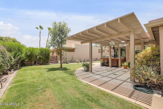 view of yard featuring a patio area, a pergola, and a hot tub