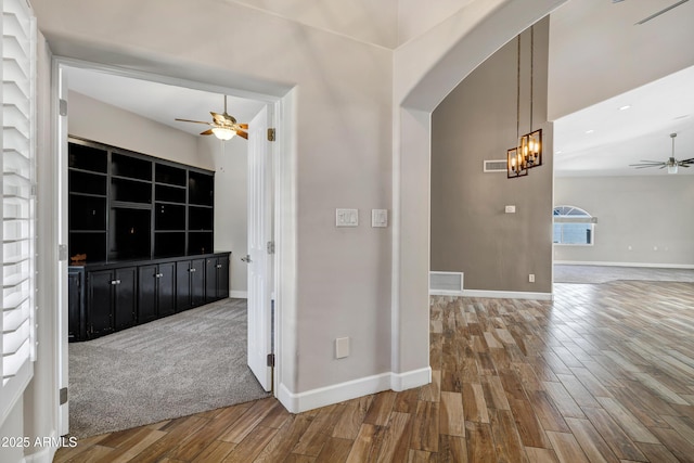 5345 E Mclellan Rd Unit 123, Mesa, AZ 85205 - corridor featuring wood finished floors, arched walkways, and baseboards