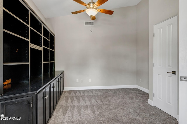 5345 E Mclellan Rd Unit 123, Mesa, AZ 85205 - unfurnished living room featuring carpet floors, a ceiling fan, and baseboards