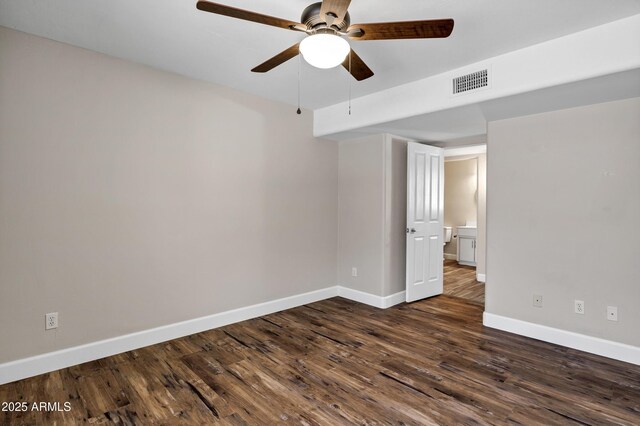 5345 E Mclellan Rd Unit 123, Mesa, AZ 85205 - spare room featuring a ceiling fan, dark wood-type flooring, and baseboards