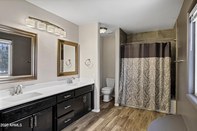5345 E Mclellan Rd Unit 123, Mesa, AZ 85205 - full bathroom with toilet, double vanity, wood finished floors, and shower / bath combo with shower curtain