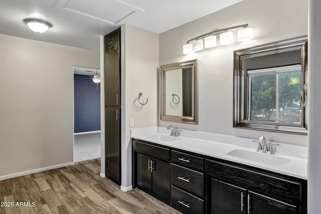 5345 E Mclellan Rd Unit 123, Mesa, AZ 85205 - full bathroom with wood finished floors, double vanity, and baseboards