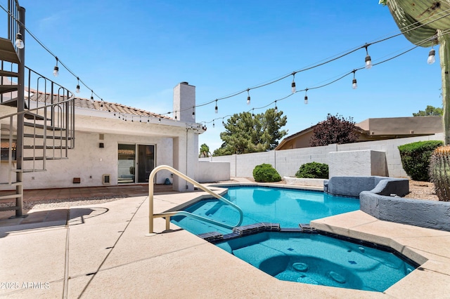 5345 E Mclellan Rd Unit 123, Mesa, AZ 85205 - view of pool featuring stairs, a patio area, a pool with connected hot tub, and a fenced backyard