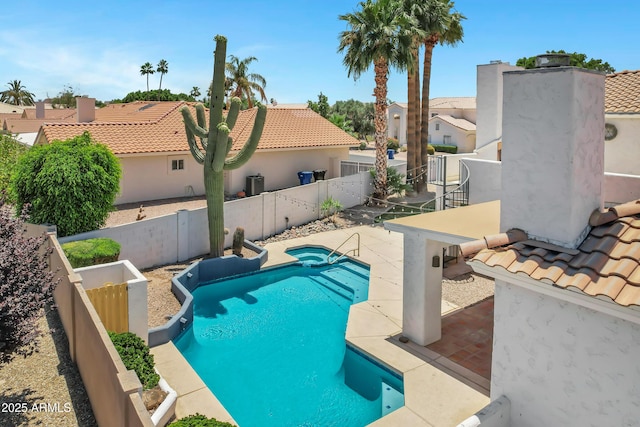 5345 E Mclellan Rd Unit 123, Mesa, AZ 85205 - view of pool with a fenced backyard, a patio, a pool with connected hot tub, and a residential view
