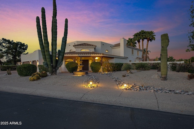 5345 E Mclellan Rd Unit 123, Mesa, AZ 85205 - view of front facade featuring stucco siding, a tile roof, and driveway