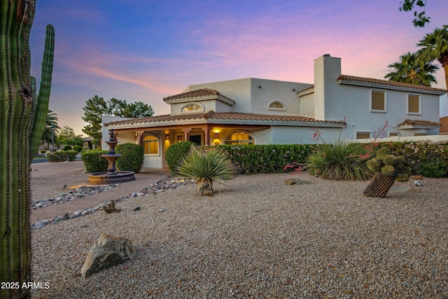 5345 E Mclellan Rd Unit 123, Mesa, AZ 85205 - mediterranean / spanish-style home with a chimney, a tile roof, and stucco siding