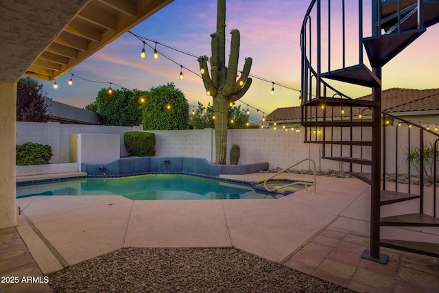 5345 E Mclellan Rd Unit 123, Mesa, AZ 85205 - pool at dusk with a fenced backyard, a patio area, and a pool with connected hot tub