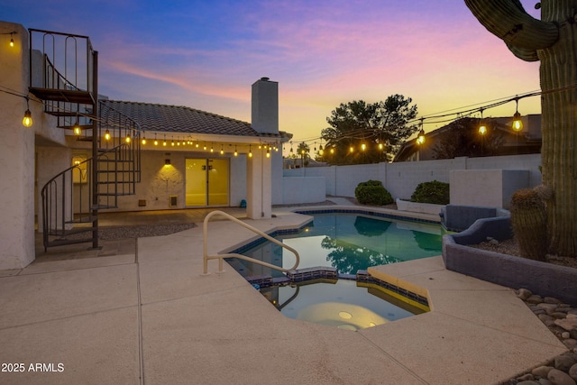 5345 E Mclellan Rd Unit 123, Mesa, AZ 85205 - pool at dusk featuring a patio, a fenced backyard, and a pool with connected hot tub